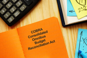 Photo of words COBRA Consolidated Omnibus Budget Reconciliation Act