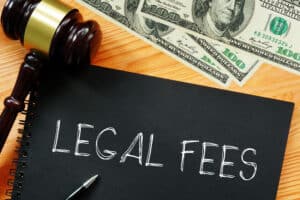 Legal fees are shown using a text and photo of dollars